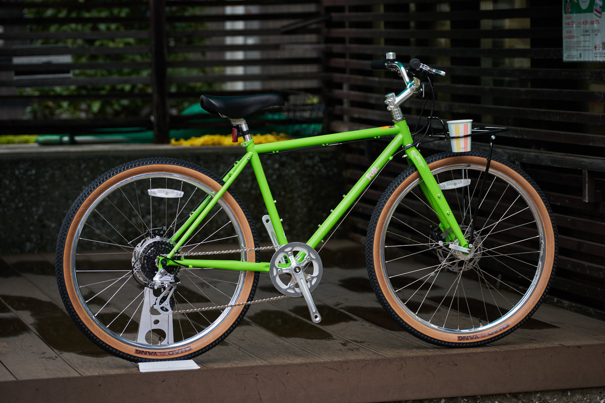 真横から見た自転車（緑）