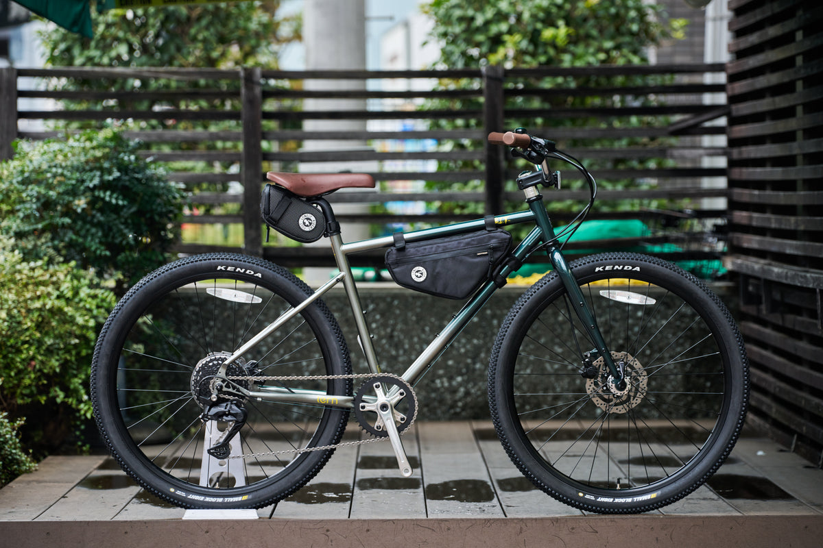 真横から見た自転車（深緑）